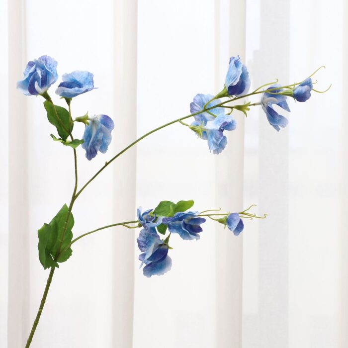 Realistic blue sweet pea artificial flower spray perfect for floral arrangements and wedding decor.