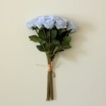 Bouquet of light blue silk roses, ideal for wedding decor and floral arrangements.