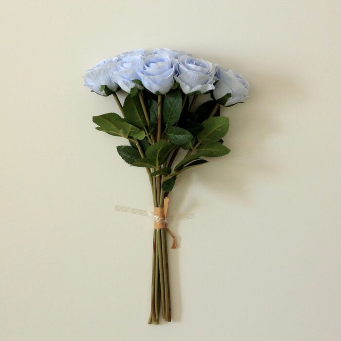 Bouquet of light blue silk roses, ideal for wedding decor and floral arrangements.