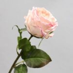 Realistic pink rose artificial flower suitable for wedding and decorative arrangements.