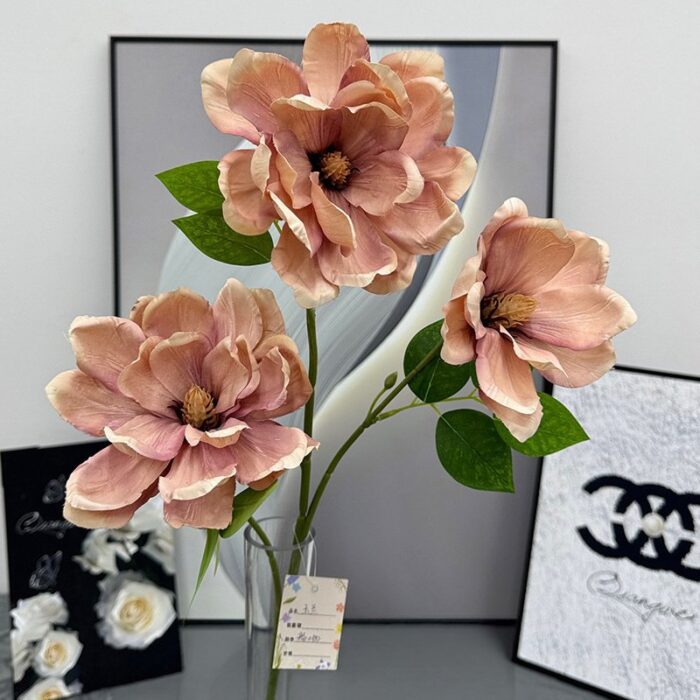 Three silk magnolia flowers, a beautiful artificial flower arrangement perfect for wedding decor.