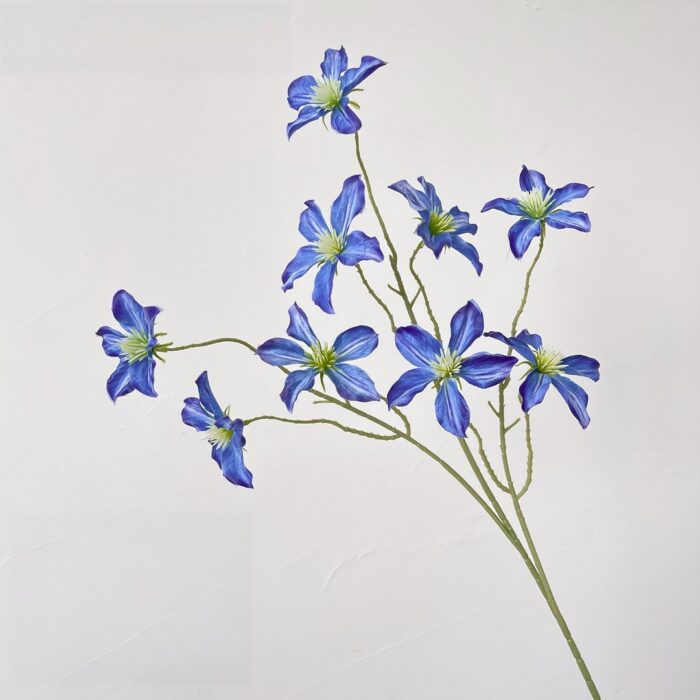 Beautiful blue silk clematis garland, perfect faux wedding flowers for realistic wedding decor.