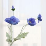 Blue and purple faux corn poppy bouquet, perfect for wedding decor and floral arrangements.