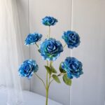 Artificial blue rose bouquet featuring multiple heads, ideal faux wedding flowers decor.