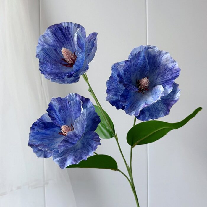 Realistic artificial flower bouquet of blue silk poppies for faux wedding flowers and decor.