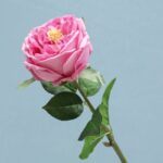 Realistic pink artificial flower rose perfect for wedding decor and crafts.
