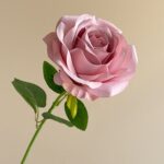 Realistic pink silk rose bloom, perfect as a high-quality faux wedding flower.