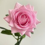 Realistic pink artificial flower rose, perfect for faux wedding flowers decor.