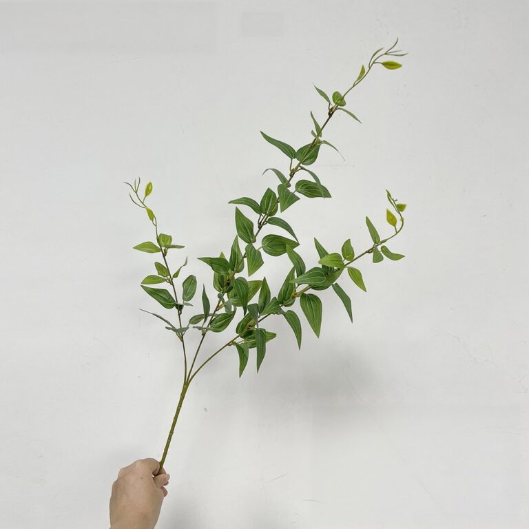 Bundle of silk green leaves for wedding decor, used as faux wedding flowers.