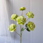 Cluster of six light green silk roses, perfect artificial flower decor for weddings.