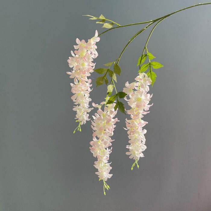 Cascading hanging faux flowers arrangement of pale pink and white blooms, perfect for wedding decor.