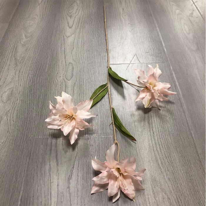 Three blush silk lilies, perfect as faux wedding flowers or romantic decorations.