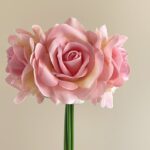 Cluster of realistic pink artificial flower roses, perfect for wedding or event decor.