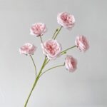 Bouquet of pink silk roses, beautiful faux wedding flowers providing a realistic real touch wedding flower accent.