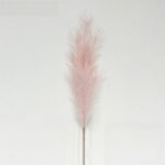 Blush faux wedding flower plume, a realistic artificial flower accent for wedding decor.