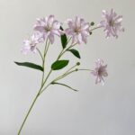 Cluster of pink silk lilies, perfect faux wedding flowers for elegant floral arrangements.