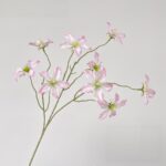 Pink silk clematis blossoms arrangement, ideal faux wedding flowers for durable decor.