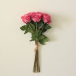 Beautiful faux wedding flowers bouquet of pink silk roses, perfect artificial flower decor.