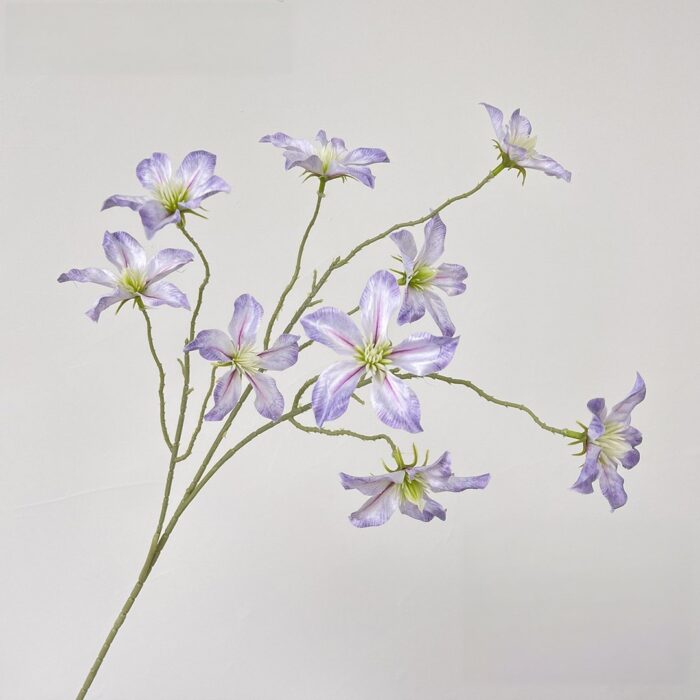 Elegant faux wedding flowers silk clematis arrangement, a lifelike artificial flower centerpiece.