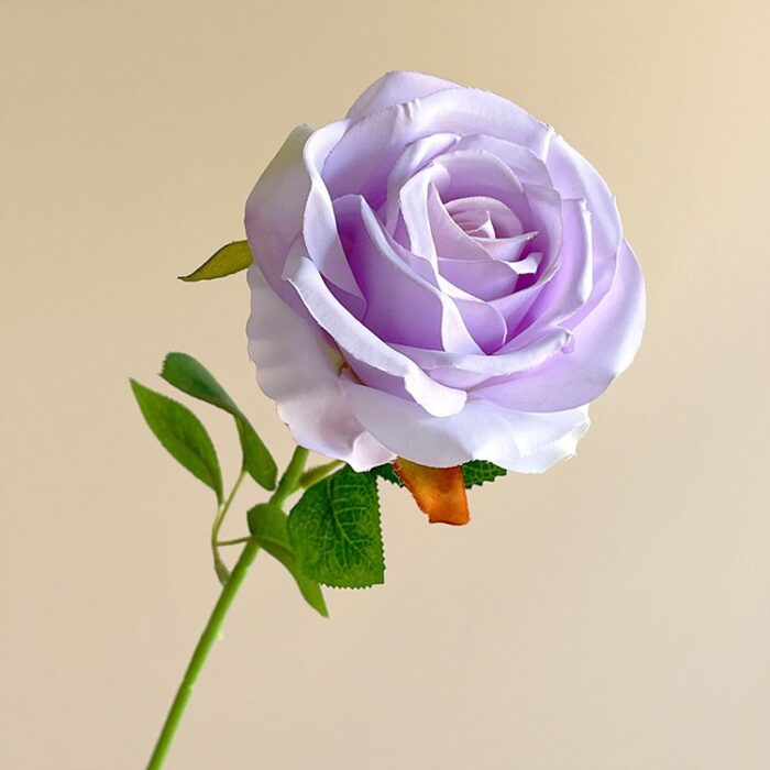 Beautiful purple silk rose, an ideal faux wedding flower and realistic artificial flower decoration.