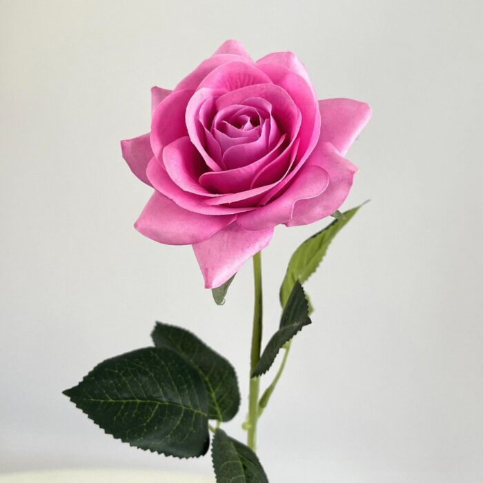 Beautiful pink artificial flower rose, perfect faux wedding flowers for lasting decor.
