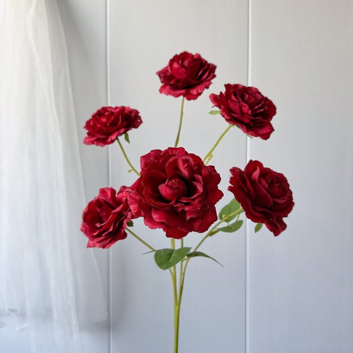 Set of six deep red silk artificial roses, perfect for faux wedding flowers arrangements.