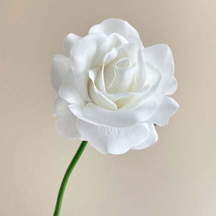 Realistic white artificial rose, perfect faux wedding flowers for elegant decor.