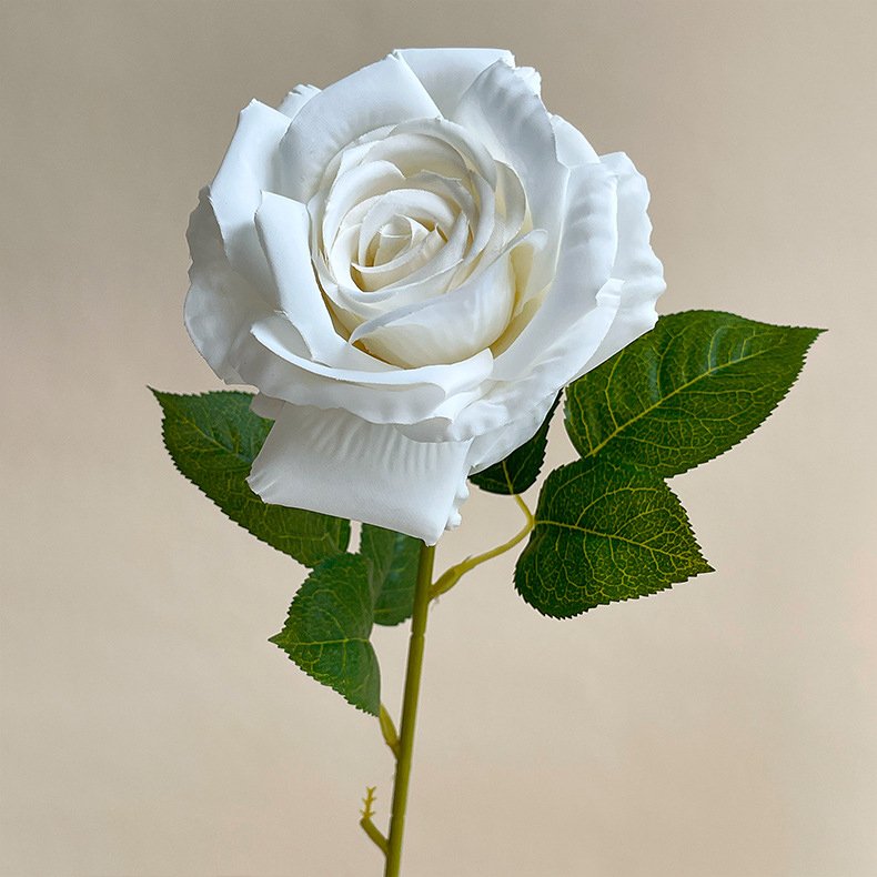 Realistic white silk rose artificial flower, ideal for wedding decor and crafts.