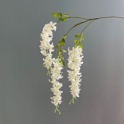 Cascading faux wedding flowers arranged on forks, perfect artificial flower decor.