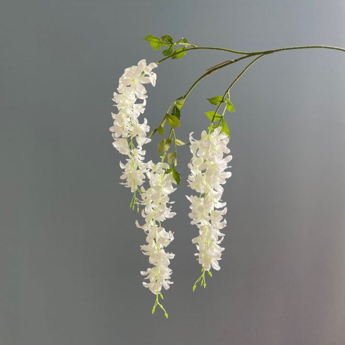 Elegant Faux Wedding Flowers - Realistic Artificial Flower Garland Cascading faux wedding flowers arranged on forks, perfect artificial flower decor.