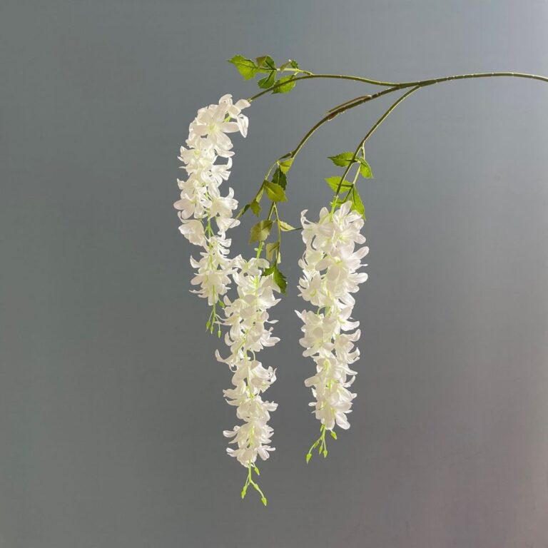 Cascading faux wedding flowers arranged on forks, perfect artificial flower decor.