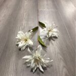 Three realistic faux white lily heads perfect for wedding decor and floral arrangements.