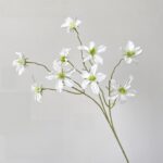 Artificial silk clematis flowers perfect for wedding decor and boutonnieres.