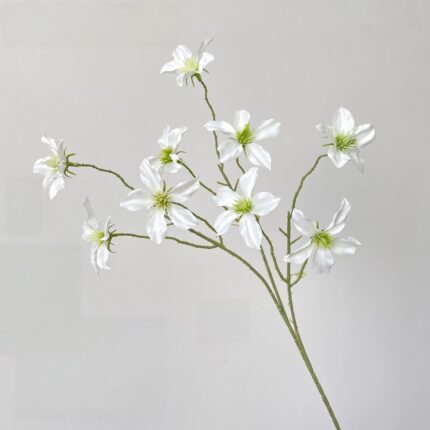 Artificial silk clematis flowers perfect for wedding decor and boutonnieres.