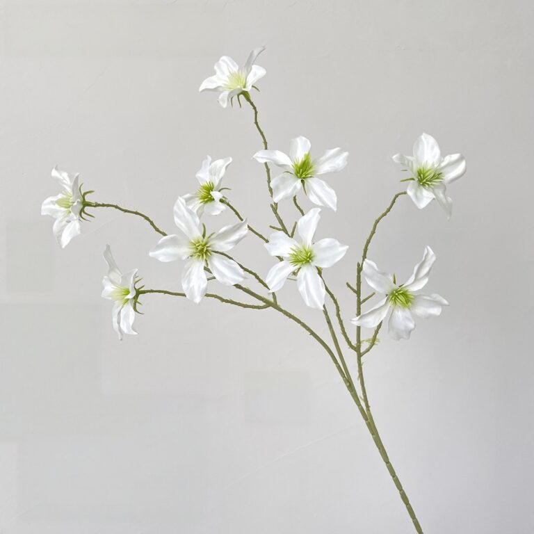 Artificial silk clematis flowers perfect for wedding decor and boutonnieres.