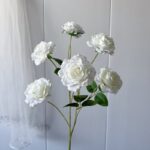 Cluster of white artificial flower roses, ideal faux wedding flowers arrangement.