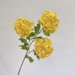 Three heads of realistic yellow artificial flower hydrangeas, perfect for faux wedding floral arrangements.