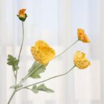 Realistic faux wedding flowers featuring bright orange corn poppies on stems for floral arrangements.