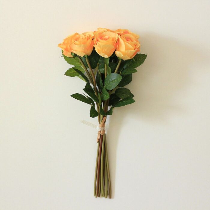 Bouquet of orange silk roses, perfect faux wedding flowers for decor.