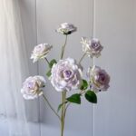 Six heads of realistic faux silk roses for decorative wedding arrangements.