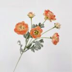 Cluster of peach artificial lotus flowers, ideal faux wedding flowers for lasting bouquets.