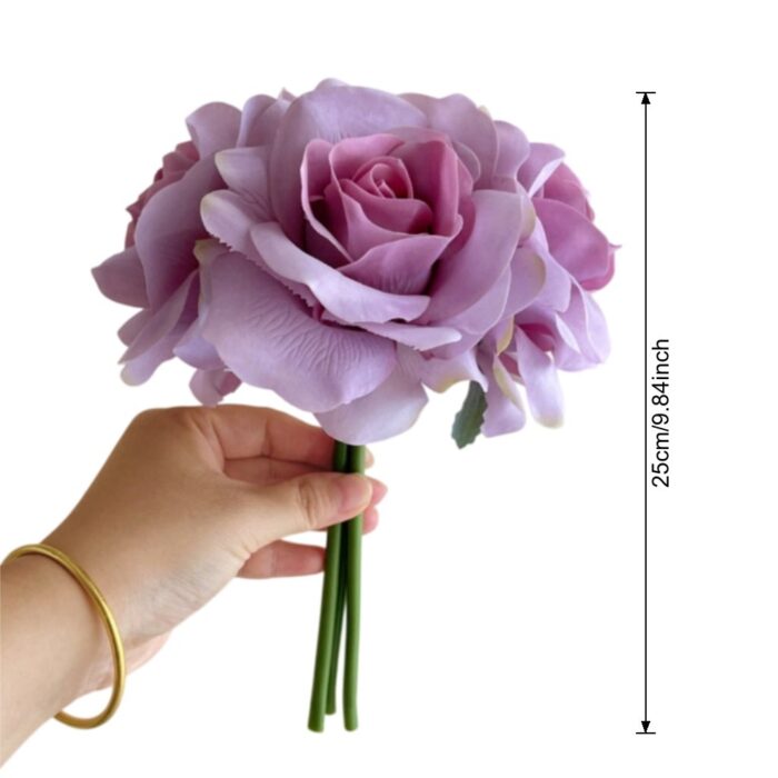 Bouquet of purple faux roses, realistic artificial flowers perfect for wedding decor.