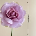 Beautiful lavender faux rose, a realistic artificial flower for wedding and home decor.