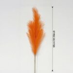 Tall orange artificial feather reed ideal for craft projects and creating faux wedding flowers.