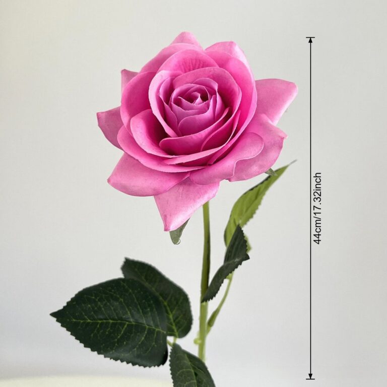 Vibrant pink artificial flower rose, suitable as faux wedding flowers for decorations.