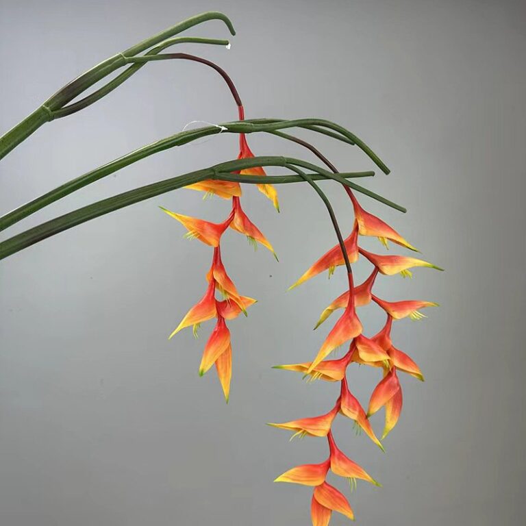 Two orange real touch hanging bird of paradise stems